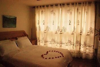 Yangguang Xingzuo Apartment Hotel Чунцін Екстер'єр фото