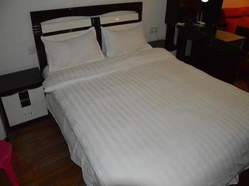 Yangguang Xingzuo Apartment Hotel Чунцін Екстер'єр фото